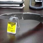 Clearance pocket knife on a wooden desk.