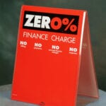Red sign with zero percent finance charge.