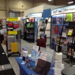Trade show booth with plastic display fixtures.