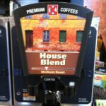 Coffee dispenser labeled "House Blend Medium Roast".